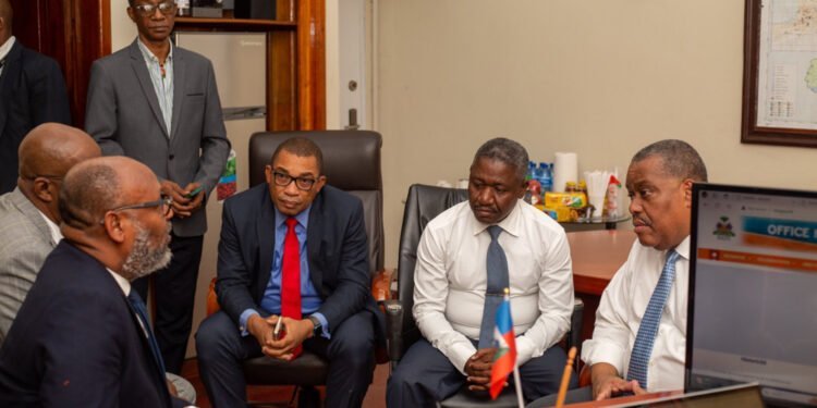 Garry Conille Visite Office National Identification