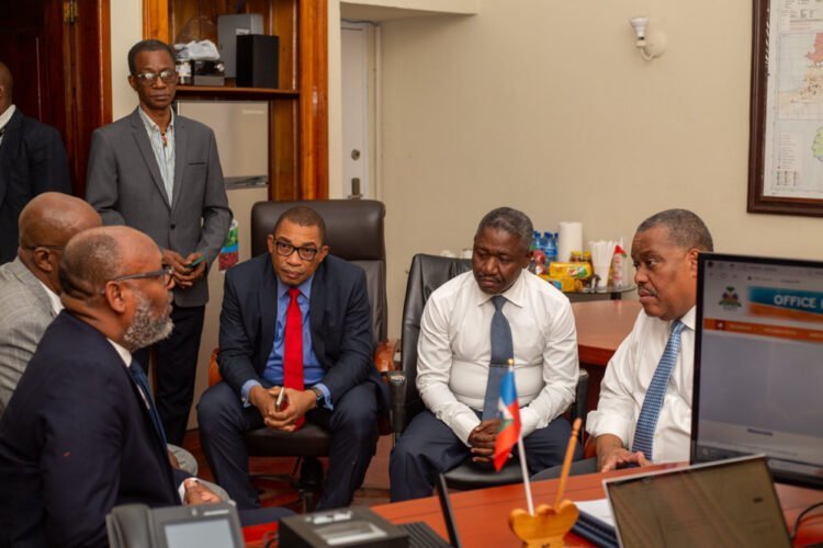 Garry Conille Visite Office National Identification