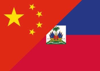 Rencontre diplomatique entre Haïti et la Chine illustrant un changement d’alliance stratégique face à Taïwan.